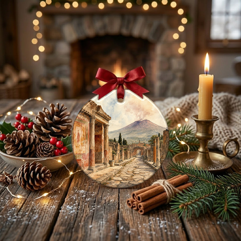 Rustic table display with natural pinecone accents and candle glow around the holiday ornament.