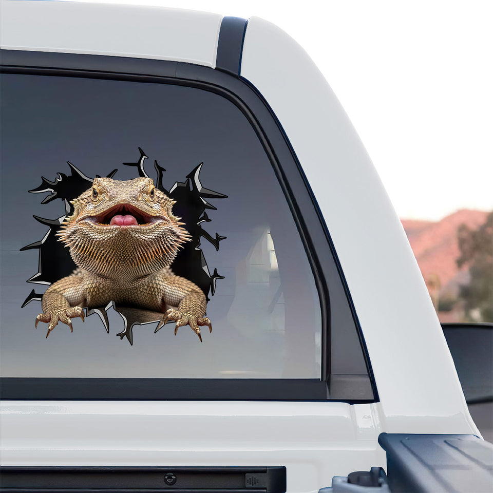 Vibrant reptile vinyl sticker displayed proudly on the back window of a truck.