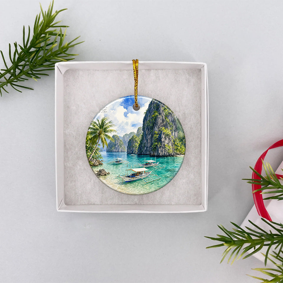 Round island holiday keepsake resting securely inside an opened white gift box.