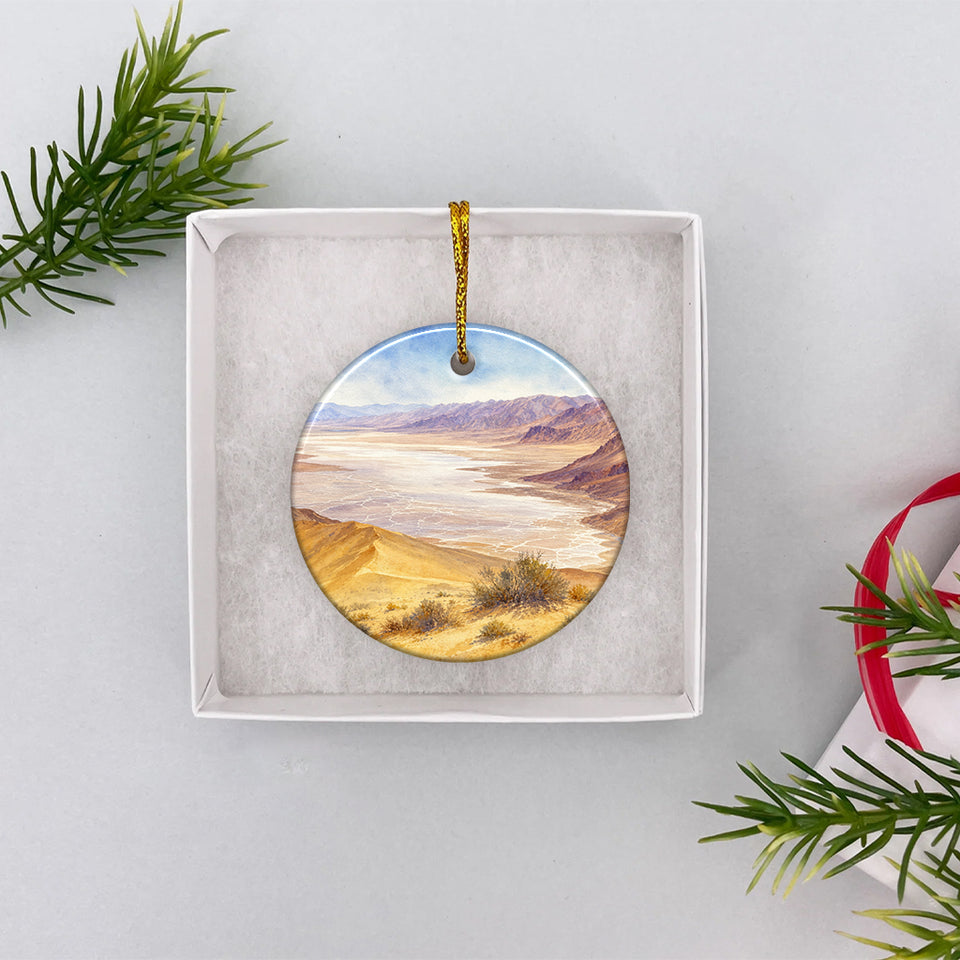 Ceramic Badwater Basin ornament nestled neatly inside an opened white gift box for travelers.
