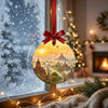 Scenic pagoda artwork suspended in front of a bright winter window with soft natural daylight.