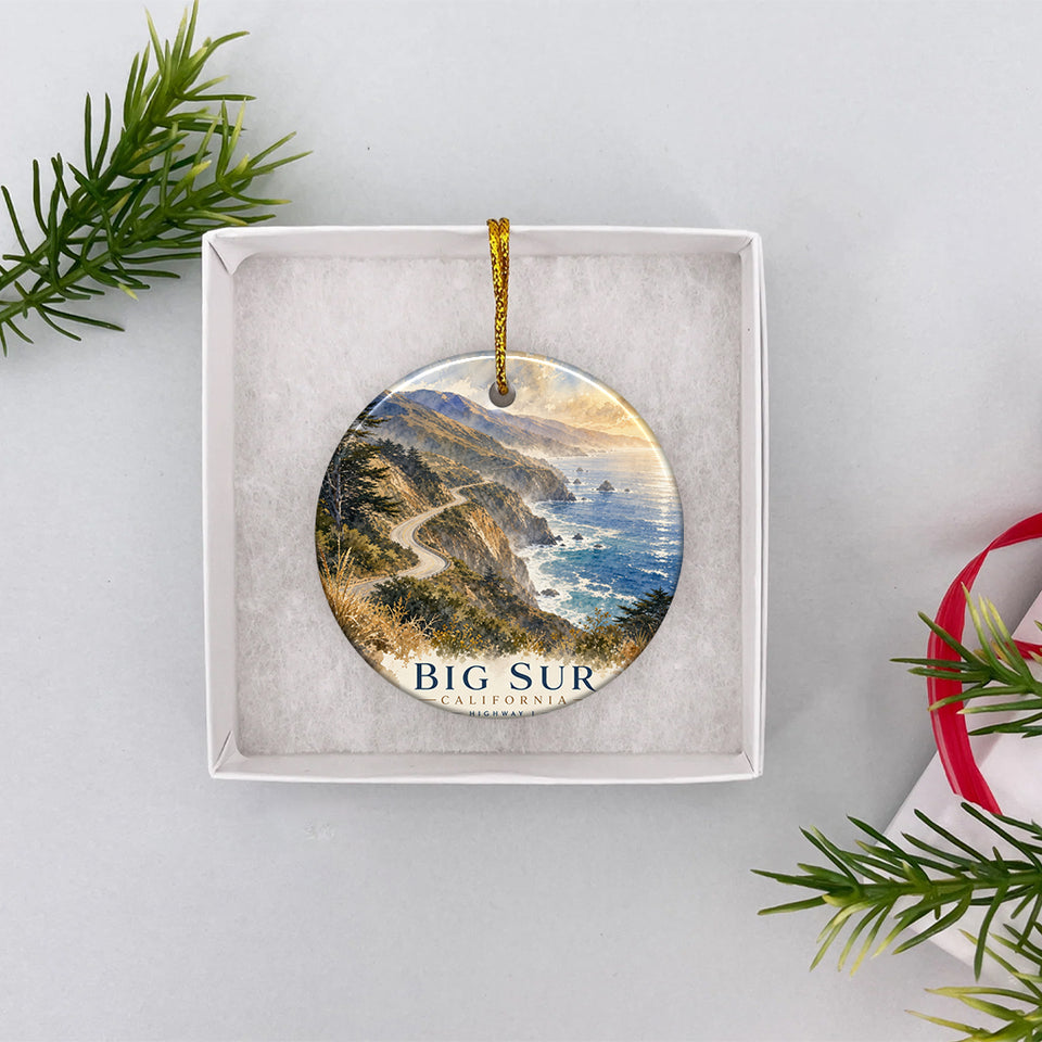 Two-sided Big Sur coastal ornament presented inside an open white gift box ready for Christmas giving.