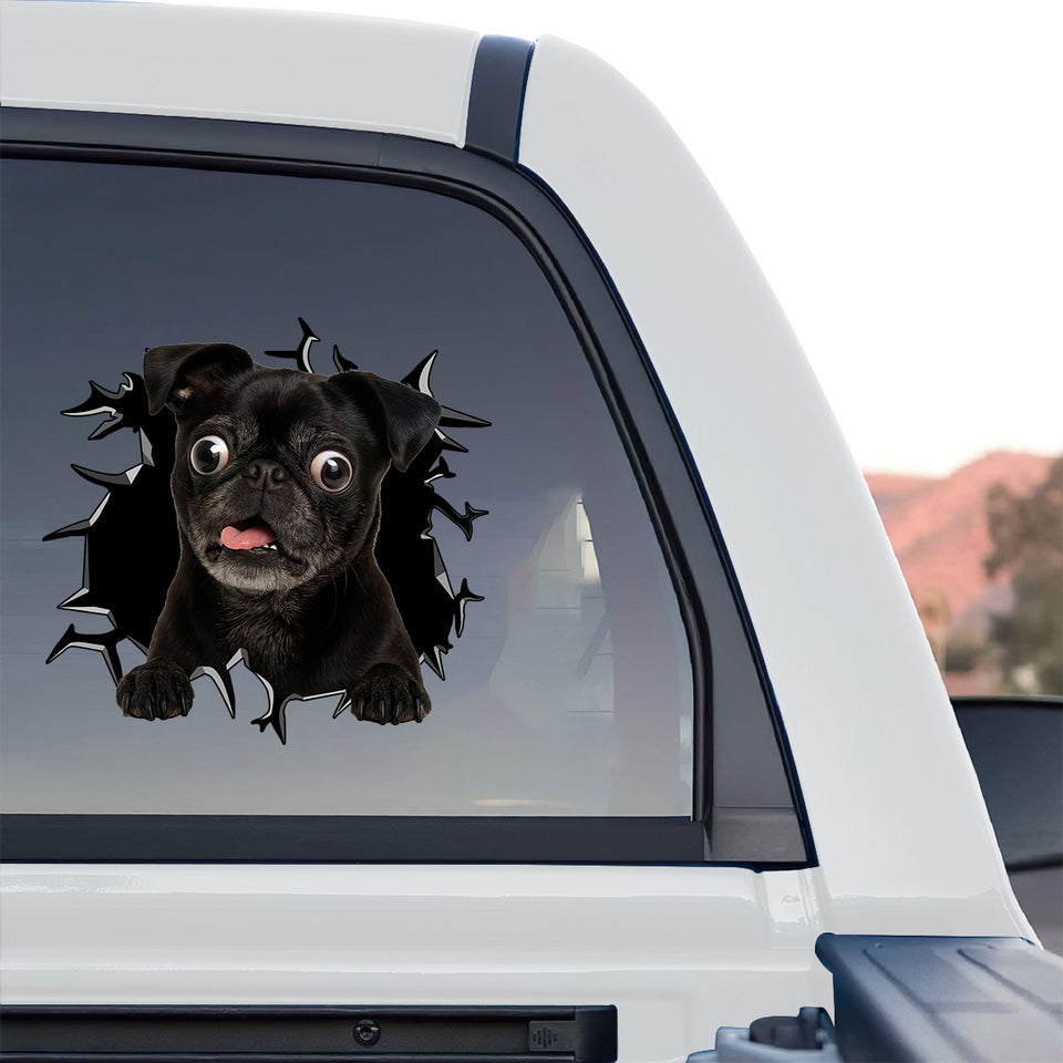 Playful Black Pug graphic sticker applied to the rear window of a truck.