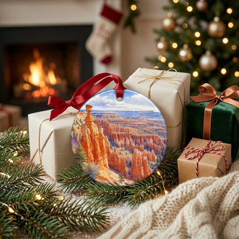 Southwest travel ornament placed beside wrapped holiday gifts near a warm brick hearth.