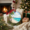 Festive scene with holiday gifts and a fireplace beside the colorful tropical beach keepsake.
