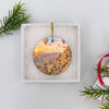 Hot air balloon Cappadocia travel ornament presented inside an open white gift box.