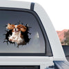 Glossy spaniel dog graphic decal displayed on the back glass of a truck.