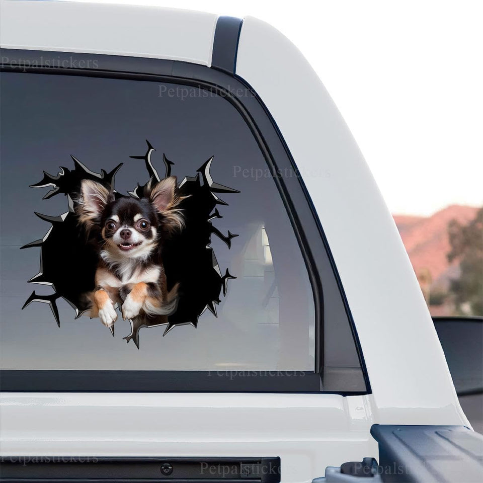 Chihuahua graphic decal artwork showing a cute pup peeking through broken glass on a standalone product design.