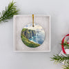 Seaside landmark holiday keepsake presented inside an open white gift box ready for gifting.