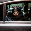 Humorous Dachshund cracked glass sticker placed neatly onto a smooth car door surface.