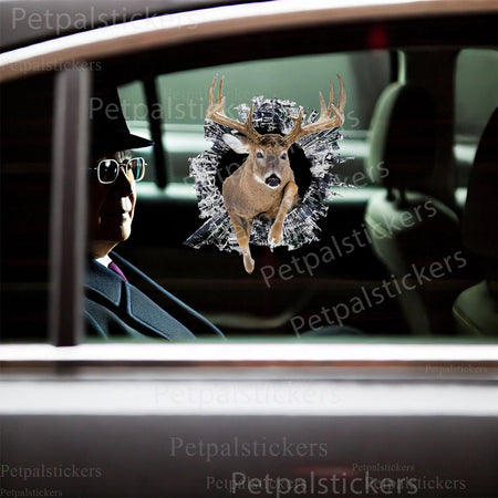 Unique deer artwork decal applied to a smooth ceramic toilet tank surface.