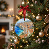Holiday ornament featuring Dubrovnik stone walls hanging from an evergreen tree with glowing holiday lights.