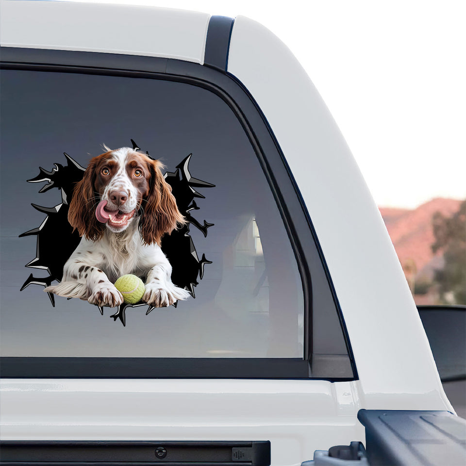 Vibrant dog sticker proudly showcased on the tinted rear glass window of a truck.