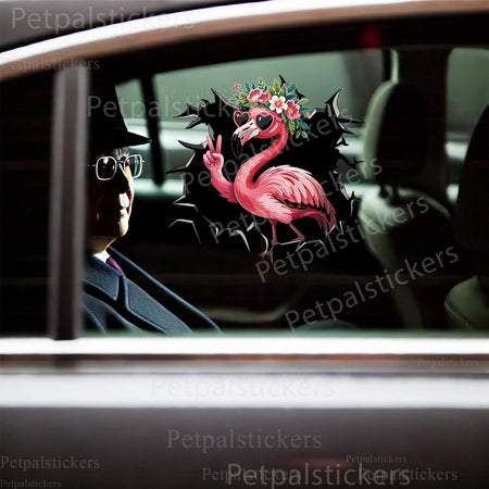Fun flamingo novelty decal applied neatly onto a smooth white toilet lid.