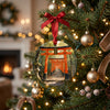Kyoto torii gate holiday ornament hanging from a glowing Christmas tree branch.