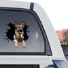 Outdoor decal featuring a German Shepherd head applied to the rear window glass of a truck.