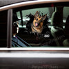 Funny German Shepherd decal displayed on a car door showing detailed cracked window art.