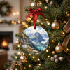 Glacier National Park holiday ornament hanging from a decorated Christmas tree branch.
