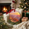 Desert canyon holiday keepsake sitting near wrapped festive gifts by a cozy glowing fireplace.