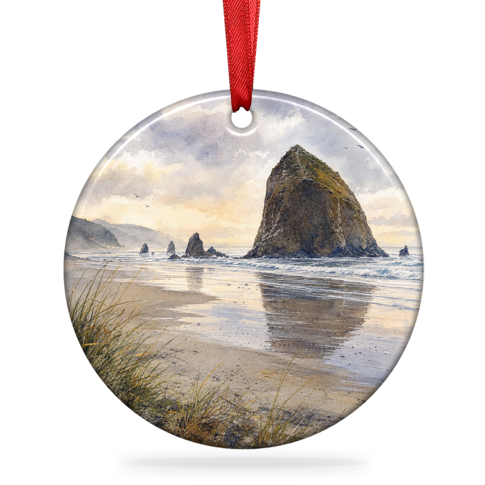 Haystack Rock ceramic ornament shown on a clean white background with hanging ribbon.
