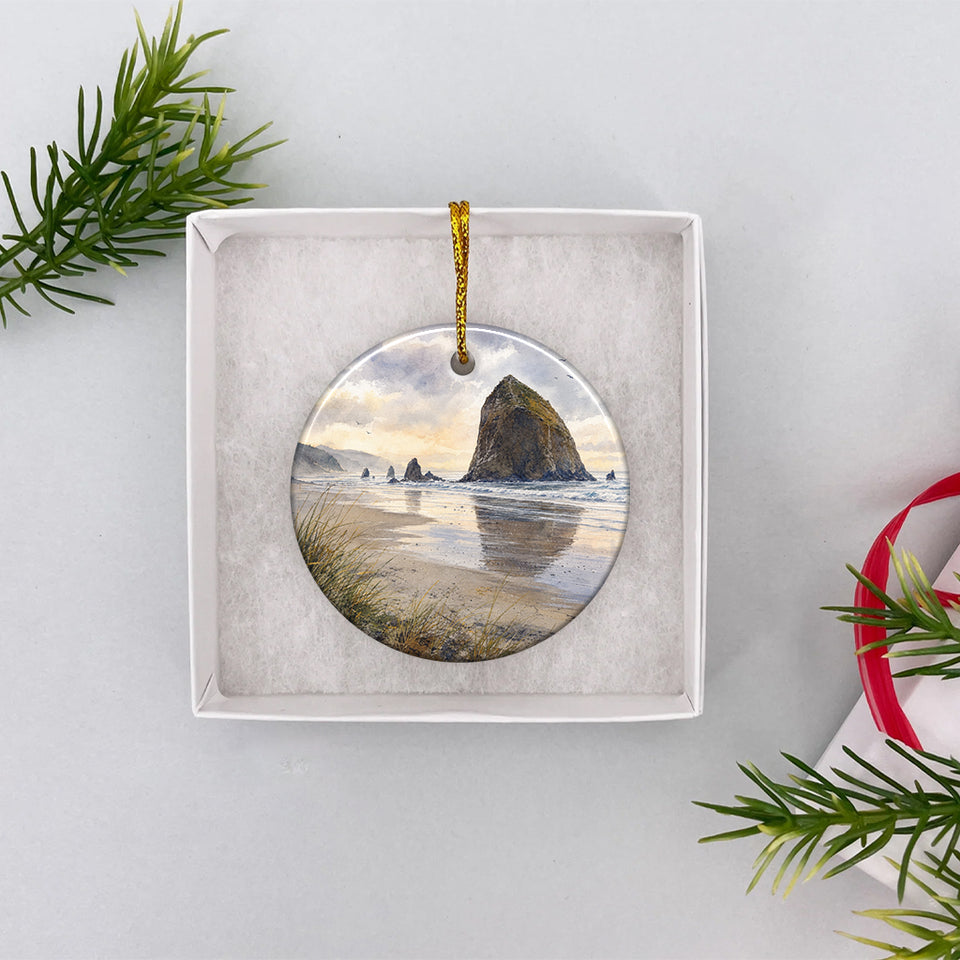 Ceramic holiday ornament placed neatly inside an open white gift box ready for giving.