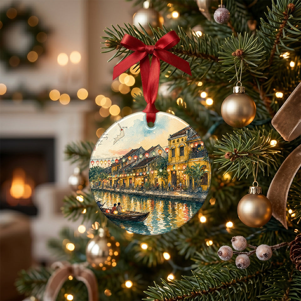 Colorful Vietnam lantern illustration ornament hanging from a branch on a lit Christmas tree.