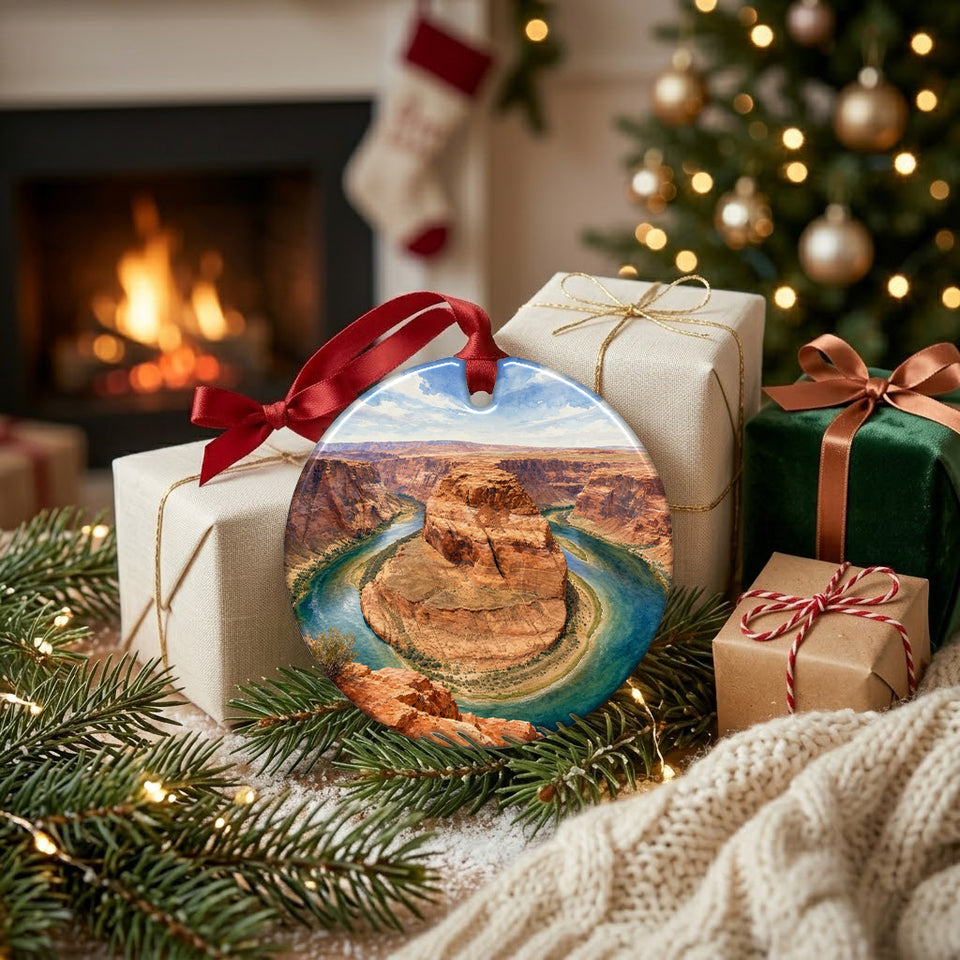 Southwest canyon holiday keepsake placed beside wrapped gifts near the glowing fireplace.