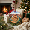 Southwest canyon holiday keepsake placed beside wrapped gifts near the glowing fireplace.