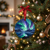 Iceland glacier lagoon holiday keepsake hanging on a lit Christmas tree branch among festive lights.
