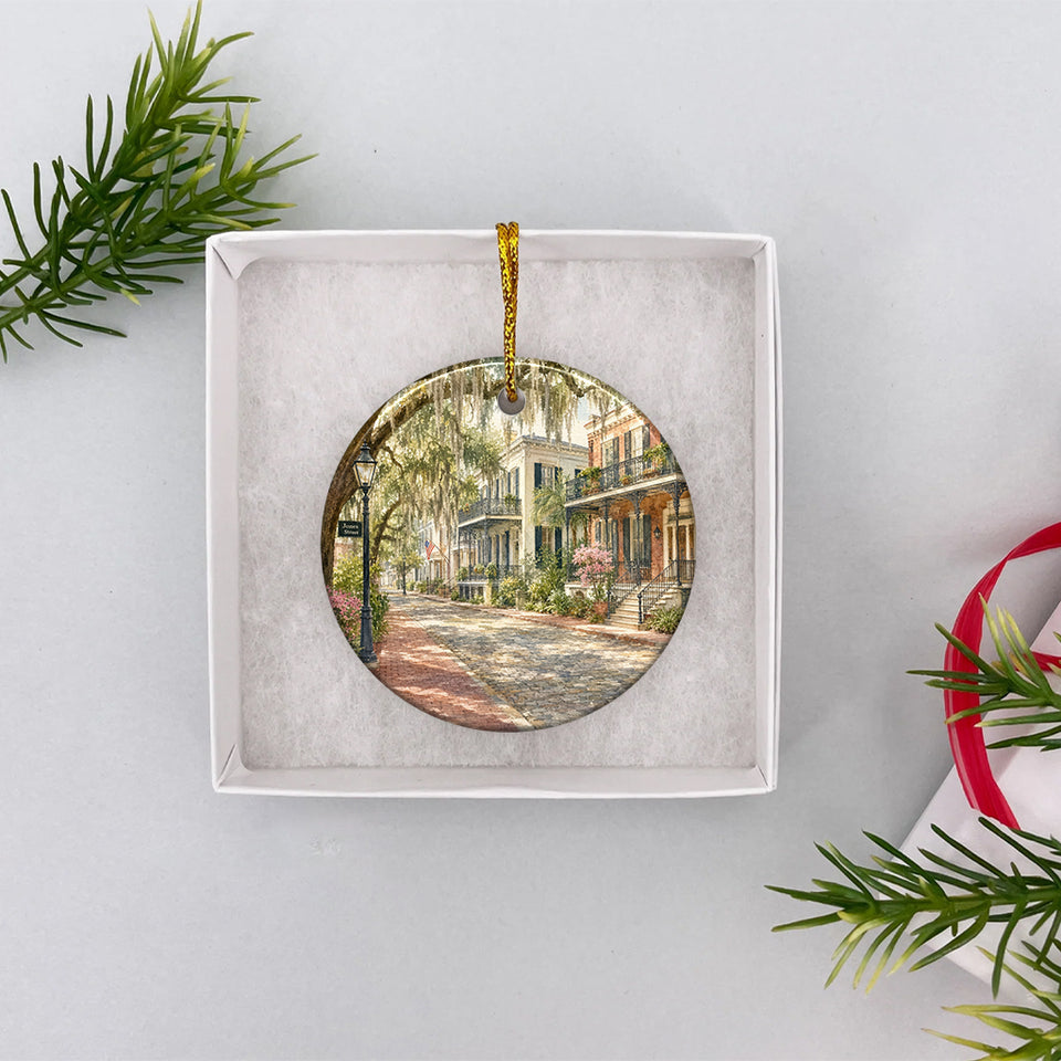 Southern keepsake ceramic ornament shown nestled inside an open elegant white gift box ready for giving.