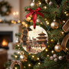 Ceramic Kathmandu Durbar Square ornament hanging on an illuminated Christmas tree branch.