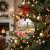 Dutch tulip garden holiday ornament hanging from an illuminated branch of a decorated Christmas tree.