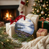 Loch Awe keepsake ornament resting beside wrapped gifts near a cozy winter hearth.