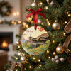 Ceramic holiday keepsake ornament featuring Kyoto temple hanging from a brightly lit Christmas tree branch.