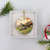 Round Japanese temple ornament packaged neatly inside an opened white gift box ready for holiday gifting.
