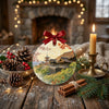 Japanese landmark holiday ornament styled on a rustic table next to a decorative pinecone and candle.
