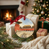 Round landmark ceramic keepsake resting alongside wrapped holiday gifts and seasonal decor.