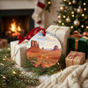 Southwest desert ornament resting near wrapped gifts by the glowing fireplace.