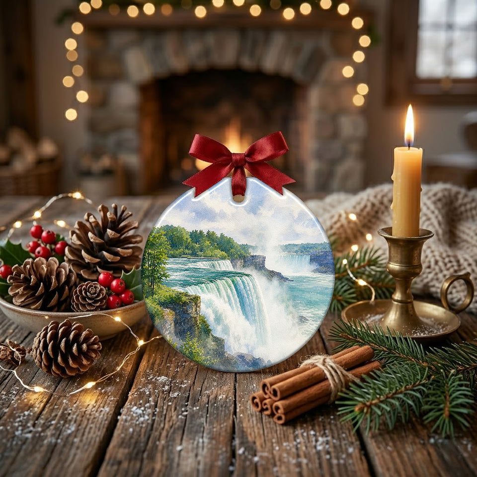 Scenic waterfall ornament resting on a rustic holiday table surrounded by pinecones and gentle candlelight.