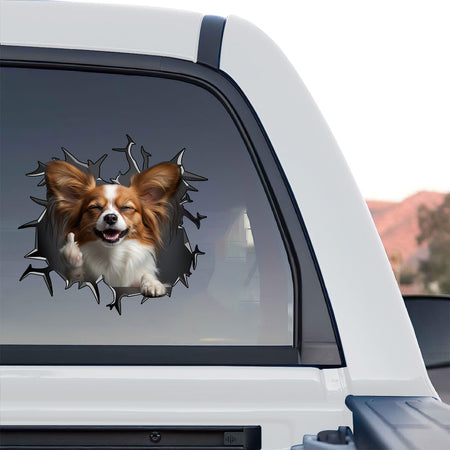 Playful Papillon dog sticker applied neatly onto a smooth white toilet lid.