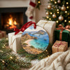 Holiday travel ornament arranged beside festive wrapped gifts and a softly glowing winter fireplace.