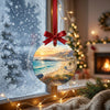 Pacific coast travel ornament hanging by a frosty winter window in soft morning daylight.