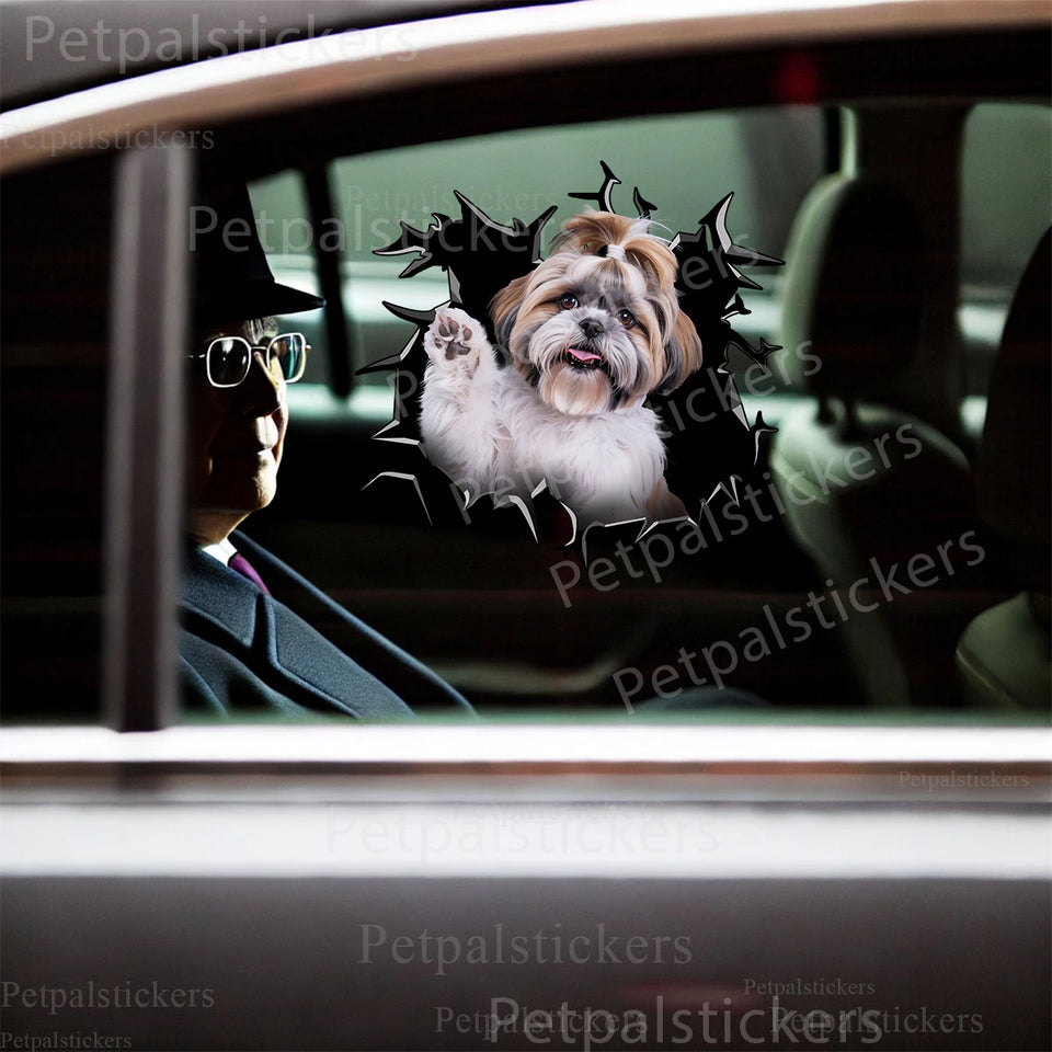 Shih Tzu waving paw graphic decal adhered to the exterior car door of a white vehicle.