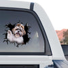Vibrant Shih Tzu window sticker displayed clearly on the back glass of a truck.
