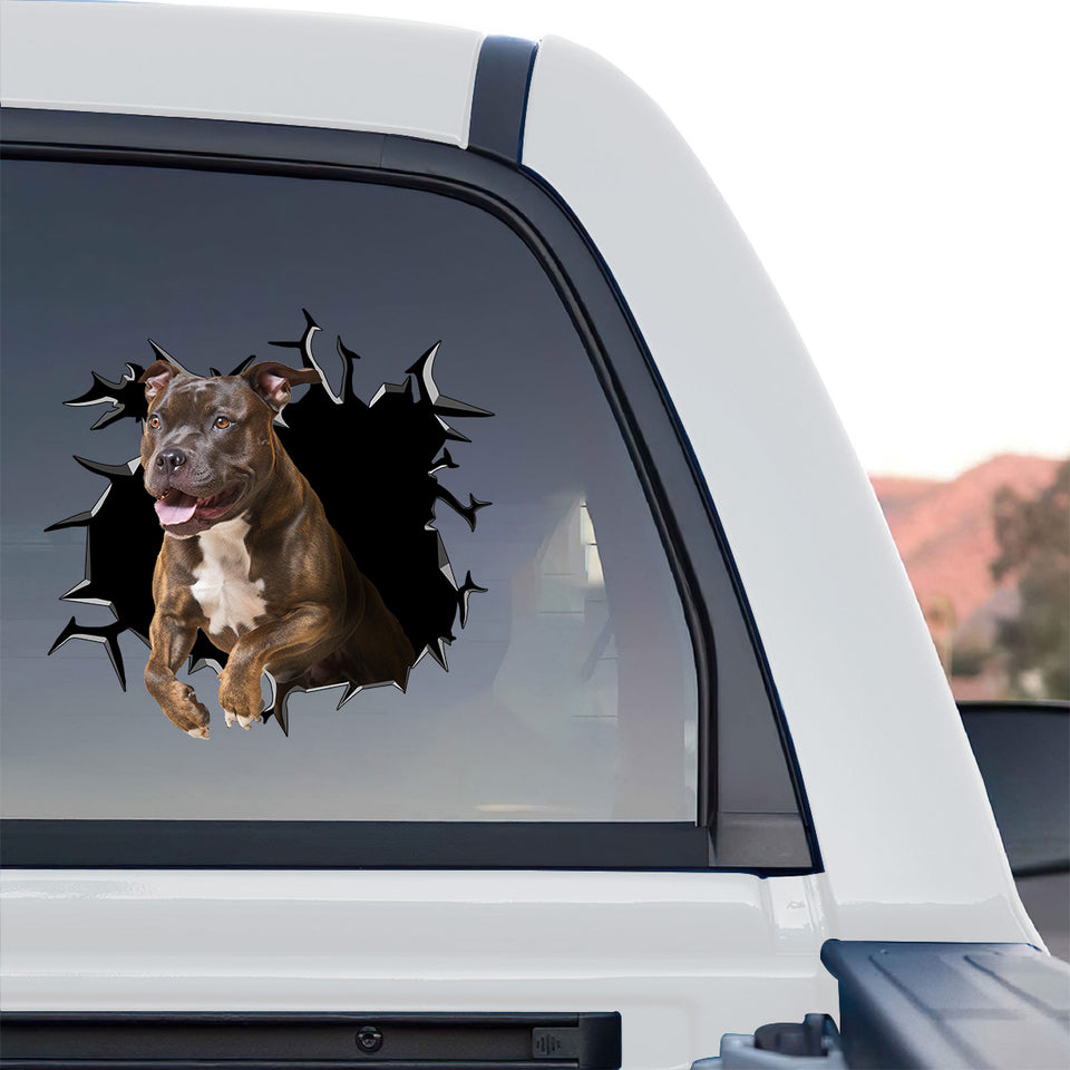 Realistic dog decal displayed prominently on the rear window of a truck.