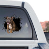 Realistic dog decal displayed prominently on the rear window of a truck.