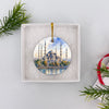 Round Blue Mosque ornament nestled neatly inside an open white gift box ready for giving.