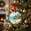 Ceramic Maya ruins holiday decoration hanging gracefully from a lighted pine branch on a Christmas tree.