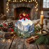 Nature-themed ceramic ornament arranged on a rustic table with decorative pinecone accents.