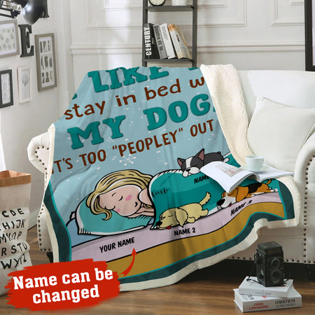 I Like My Dogs custom dog lover fleece blanket spread over a couch for cozy home decor.